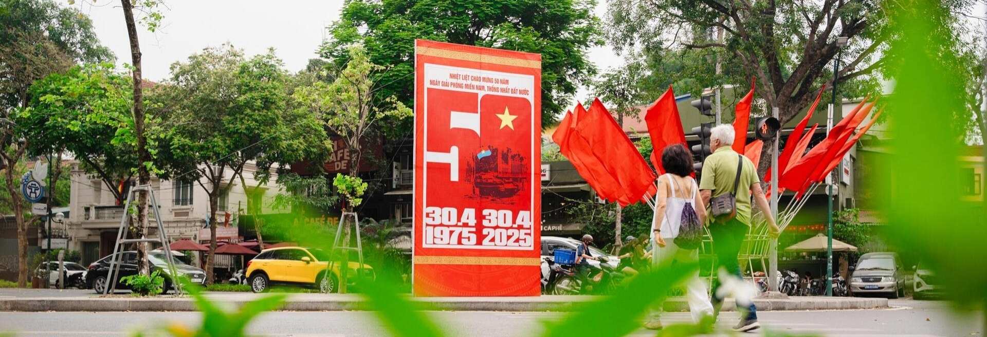 VIETNAM – The streets shine with red on Reunification Day