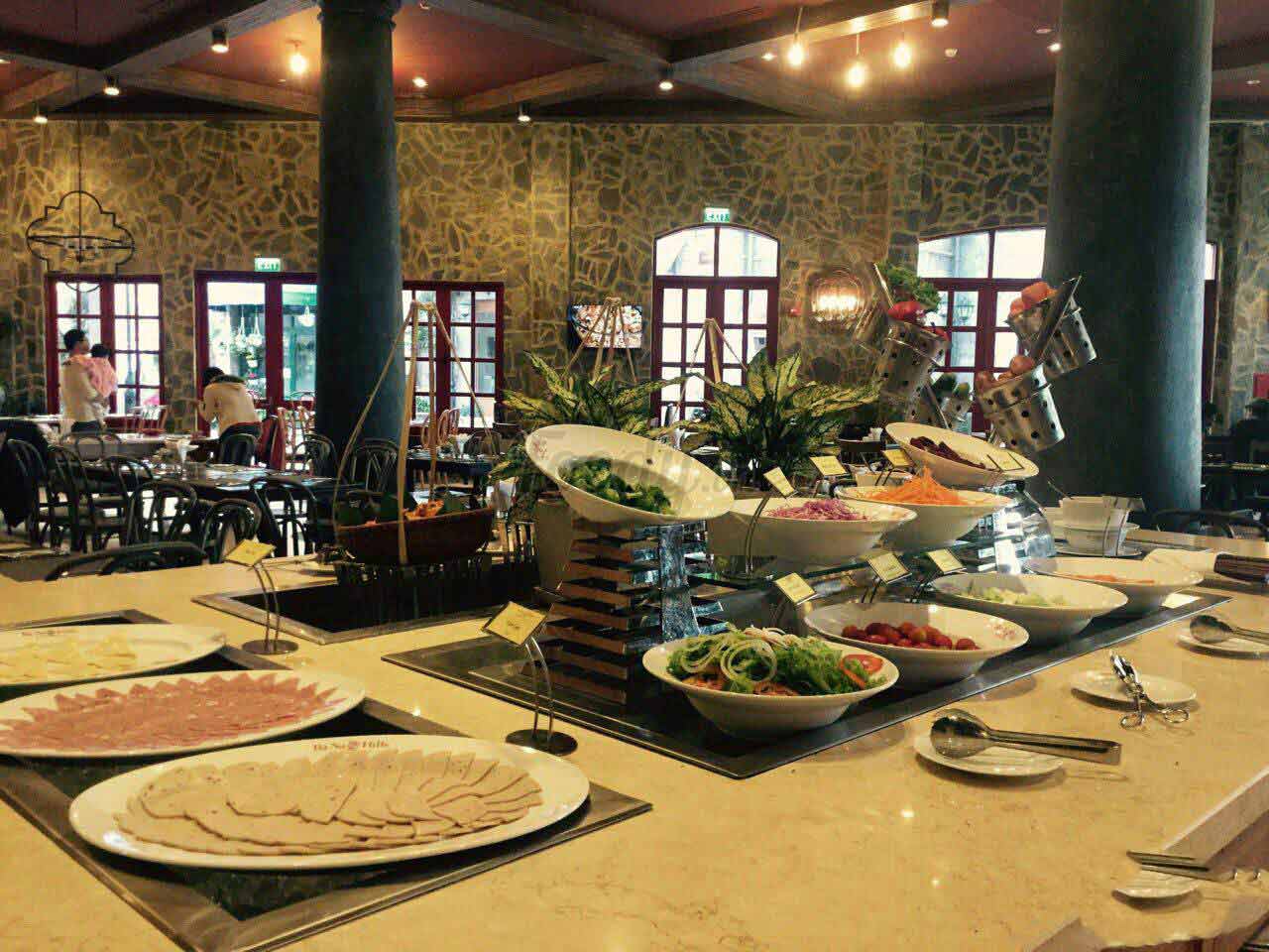 Buffet counters and cozy seating inside Arapang, a restaurant in Ba Na Hills