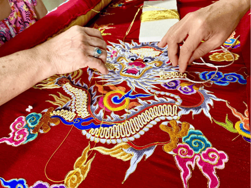 ceremonial scarves and robes is carefully prepared by artisans