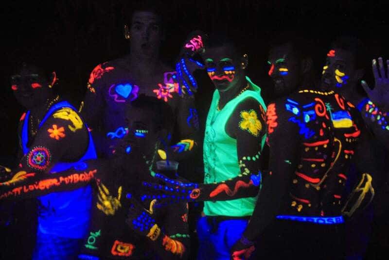 Festival participants often sport exceptional reflective and sparkling clothing