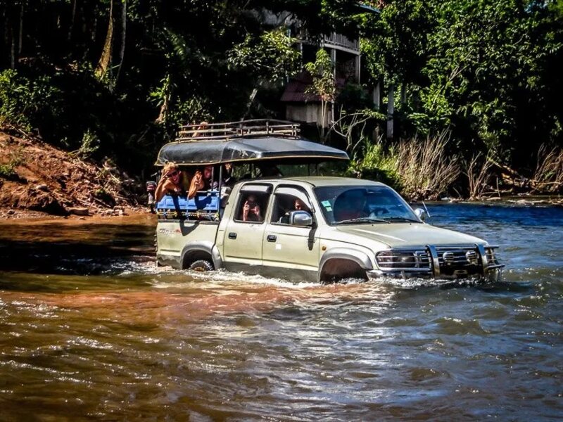 The jeep had to cross muddy roads and streams.