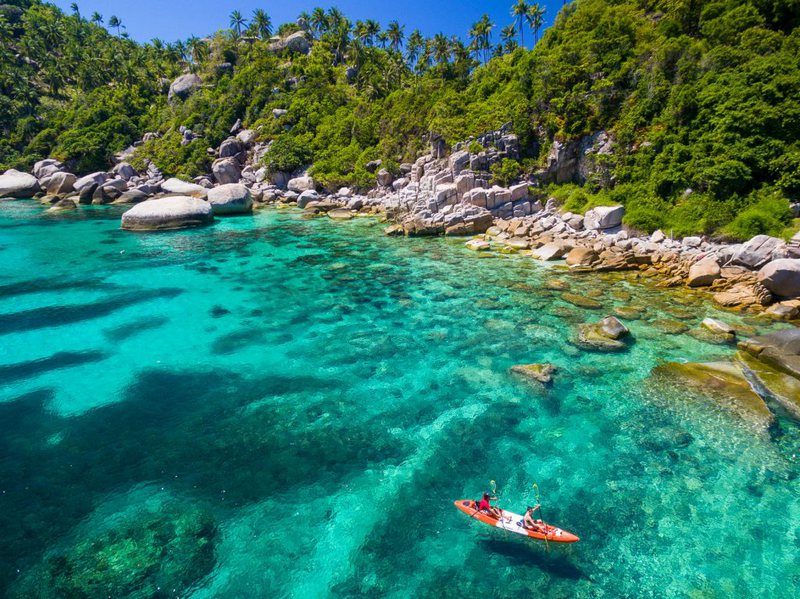 As you glide through the water, keep an eye out for colorful marine life and coral reefs.