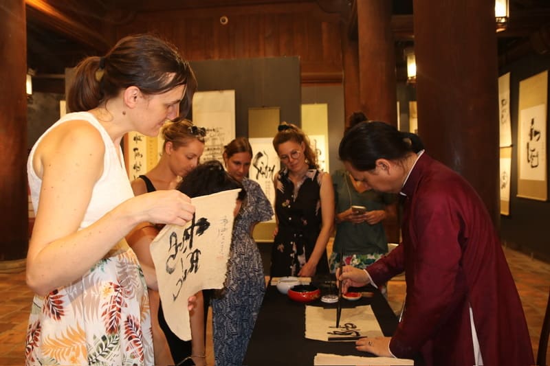 You can practice calligraphy or ask to write your favorite word at the Temple of Literature (registration fees applicable)