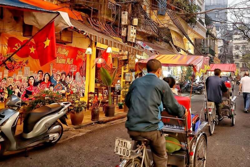 The vibrant energy of Hanois Old Quarter with its bustling streets