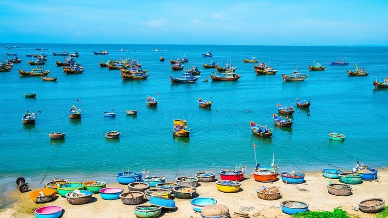 Explore the local fishing village, depicting the authentic lifestyle of the coastal community.
